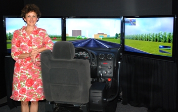 Photo of Flaura Winston in the Center for Child Injury Prevention Studies virtual simulator room.